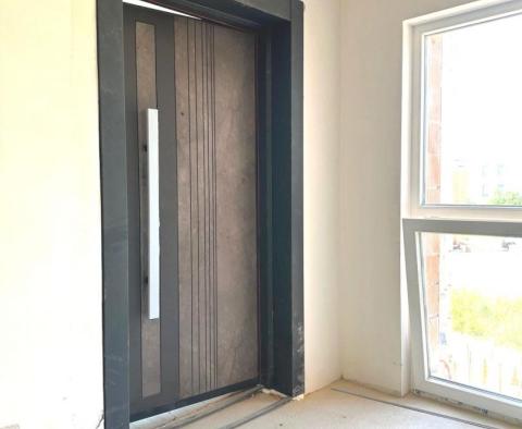 Дешевые новые апартаменты с 2 спальнями в Медулине | 1 км от моря